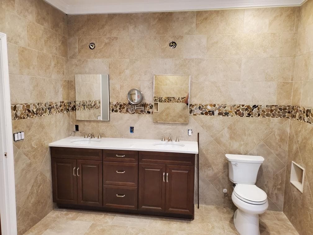 Bathroom renovation showcasing refreshed design and improved functionality