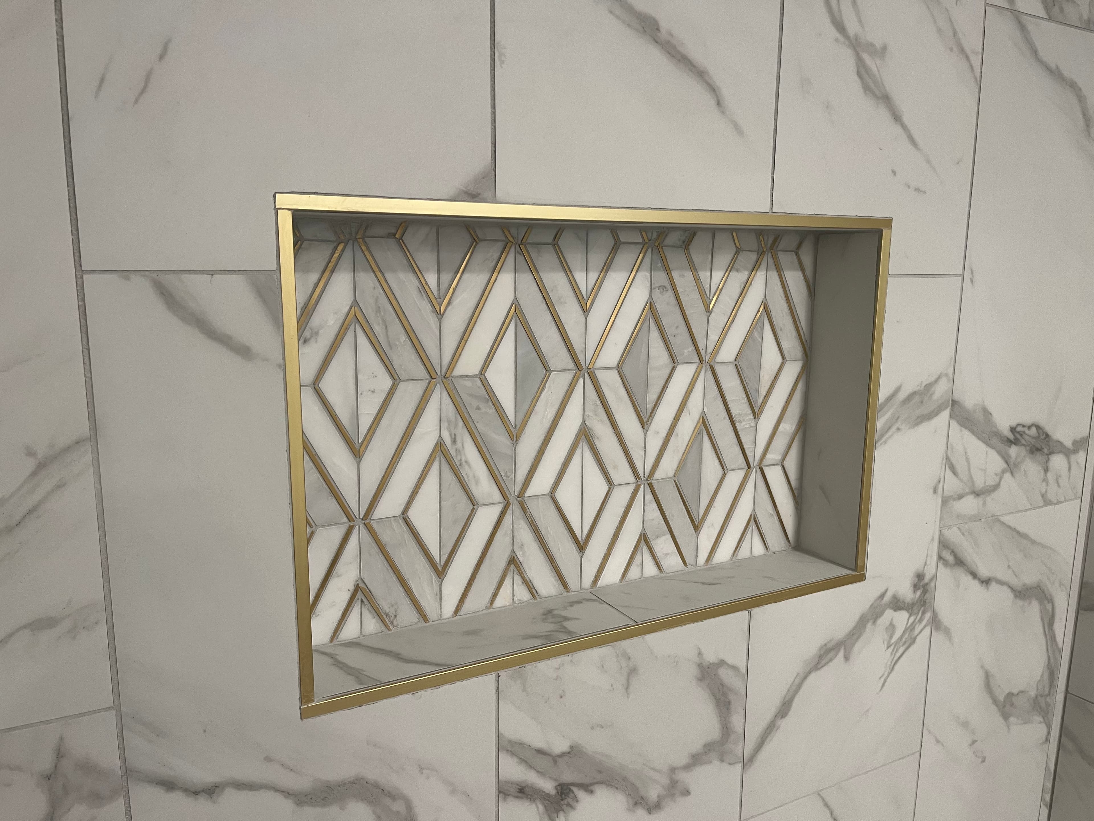 Additional view of bathroom renovation project H showing completed work