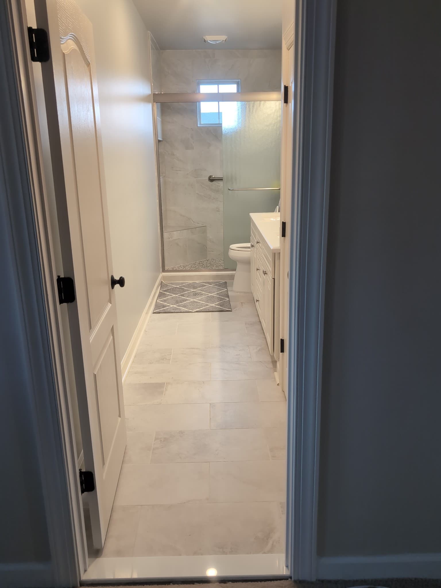 Bathroom renovation project S showcasing completed work