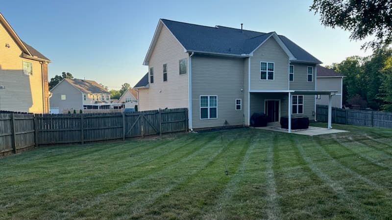 Cluttered garage with minimal storage prior to remodel