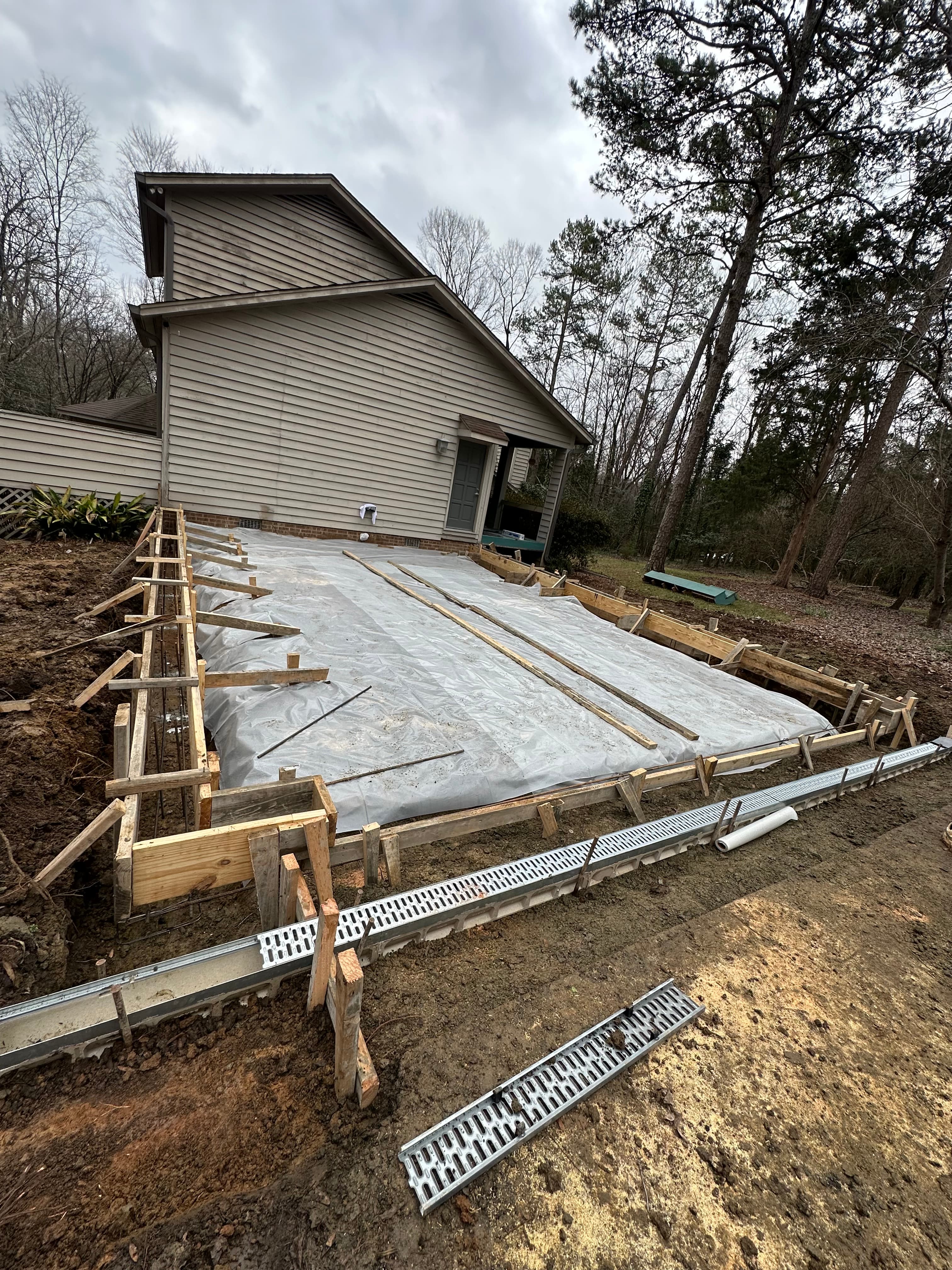 Detached garage interior before renovation with unfinished walls